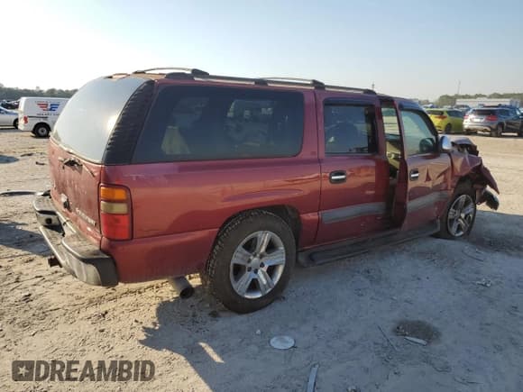 ✅ 2002 Chevrolet Suburban LT • VIN: 1GNEC16Z12J165407 • Лот: 47128145. Опубликован ранее на Copart с пробегом Не указан. Бесплатный доступ к архиву аукционных продаж из США и подробный отчёт об истории автомобиля на DreamBid. Изображение 3.
