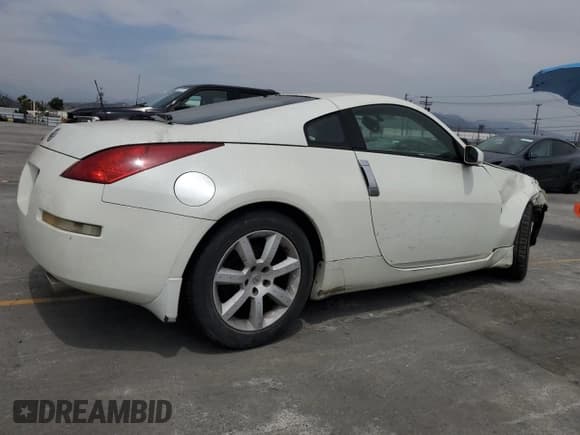 ✅ 2004 Nissan 350Z Touring • VIN: JN1AZ34D74T160909 • Lot: 58302075. Listed on Copart with 54,100 mi. Free auction sales archive from the USA and detailed vehicle history report at DreamBid. Image 3.