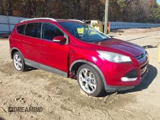 ✅ 2014 Ford Escape Titanium • VIN: 1FMCU0J91EUE20554 • Lot: 43704616. Wystawiony na IAAI z przebiegiem 128 073 mil. Bezpłatny archiwum sprzedaży aukcyjnych z USA i szczegółowy raport historii pojazdu na DreamBid. Zdjęcie 1.