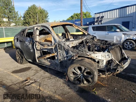 ✅ 2012 BMW X6 50i • VIN: 5UXFG8C5XCL590205 • Лот: 83867405. Опубликован ранее на Copart с пробегом Не указан. Бесплатный доступ к архиву аукционных продаж из США и подробный отчёт об истории автомобиля на DreamBid. Изображение 4.