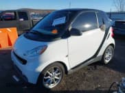 ✅ 2009 Smart fortwo Pure • VIN: WMEEJ31X99K292492 • Lot: 41029051. Listed on IAAI with 57,741 mi. Free auction sales archive from the USA and detailed vehicle history report at DreamBid. Image 2.