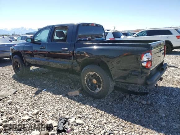 2005 Dodge Dakota ST with VIN 1D7HW28K55S259104, listed as a Copart auction lot 55859185 with 143,004 mi miles and Salvage title. Bid and sale history available at DreamBid. Image 2.