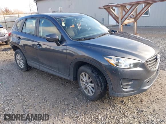 ✅ 2016 Mazda CX-5 Sport • VIN: JM3KE4BY9G0784667 • Lot: 43737851. Listed on IAAI with 151,569 mi. Free auction sales archive from the USA and detailed vehicle history report at DreamBid. Image 1.