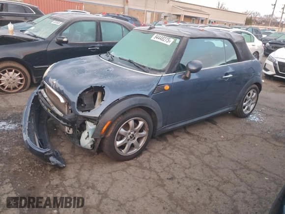 ✅ 2010 MINI Convertible • VIN: WMWMR3C59ATU97143 • Lot: 94448275. Listed on Copart with 73,173 mi. Free auction sales archive from the USA and detailed vehicle history report at DreamBid. Image 1.