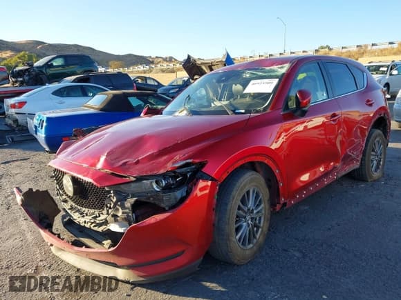 ✅ 2021 Mazda CX-5 Carbon Edition • VIN: JM3KFACM7M0323874 • Lot: 40925509. Listed on IAAI with 85,969 mi. Free auction sales archive from the USA and detailed vehicle history report at DreamBid. Image 17.