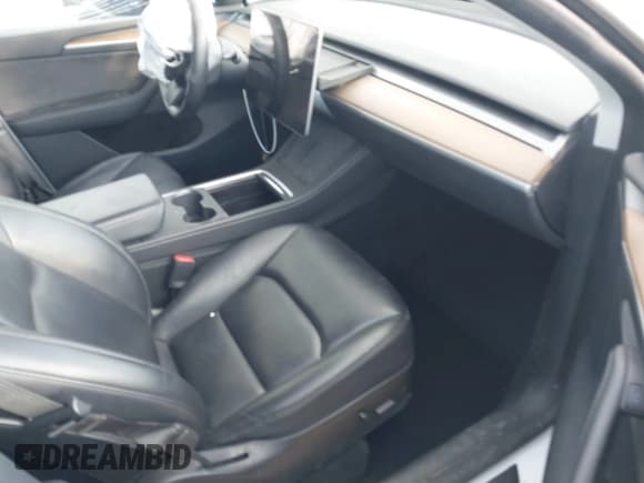 ✅ 2022 Tesla Model Y Long Range • VIN: 7SAYGAEE4NF574637 • Лот: 43749609. Опубликован ранее на IAAI с пробегом 40 947 миль. Бесплатный доступ к архиву аукционных продаж из США и подробный отчёт об истории автомобиля на DreamBid. Изображение 5.