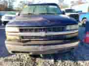 2001 Chevrolet Silverado 1500 LT z VIN 1GCEC19T11Z180375, wystawiony jako Copart lot #84170524 z przebiegiem 180 728 mil mil oraz Szkoda całkowita • Salvage title. Historia ofert i sprzedaży dostępna na DreamBid. Obrazek 5.