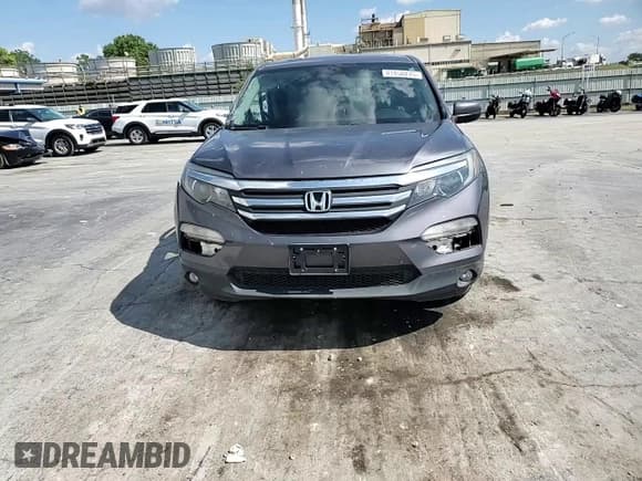 ✅ 2017 Honda Pilot EX-L • VIN: 5FNYF5H51HB044911 • Лот: 81850275. Опубликован ранее на Copart с пробегом 140 801 миль. Бесплатный доступ к архиву аукционных продаж из США и подробный отчёт об истории автомобиля на DreamBid. Изображение 14.
