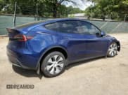 ✅ 2022 Tesla Model Y Long Range • VIN: 7SAYGAEE0NF519750 • Lot: 67638055. Listed on Copart with 51,142 mi. Free auction sales archive from the USA and detailed vehicle history report at DreamBid. Image 3.