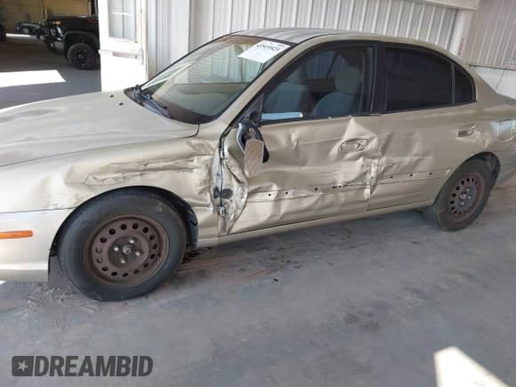 2005 Hyundai Elantra GLS z VIN KMHDN46D15U962839, wystawiony jako IAAI lot #43519523 z przebiegiem 155 453 mil mil oraz . Historia ofert i sprzedaży dostępna na DreamBid. Obrazek 6.