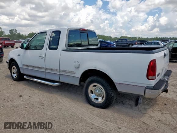 ✅ 1997 Ford F-150 XL • VIN: 1FTEX17L4VNB66944 • Lot: 62298315. Wystawiony na Copart z przebiegiem 172 314 mil. Bezpłatny archiwum sprzedaży aukcyjnych z USA i szczegółowy raport historii pojazdu na DreamBid. Zdjęcie 2.