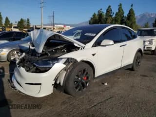 ✅ 2023 Tesla Model X Plaid • VIN: 7SAXCBE67PF409108 • Lot: 83812825. Wystawiony na Copart z przebiegiem Nie podano. Bezpłatny archiwum sprzedaży aukcyjnych z USA i szczegółowy raport historii pojazdu na DreamBid. Zdjęcie 1.
