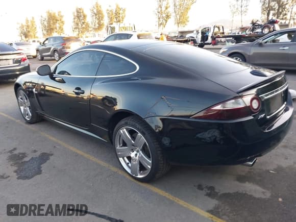 ✅ 2008 Jaguar XK • VIN: SAJWA43B985B23987 • Lot: 41197091. Listed on IAAI with 54,803 mi. Free auction sales archive from the USA and detailed vehicle history report at DreamBid. Image 3.