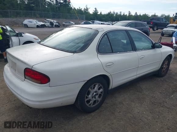 ✅ 2001 Oldsmobile Intrigue GX • VIN: 1G3WH52H61F110519 • Lot: 43106295. Wystawiony na IAAI z przebiegiem 106 501 mil. Bezpłatny archiwum sprzedaży aukcyjnych z USA i szczegółowy raport historii pojazdu na DreamBid. Zdjęcie 4.