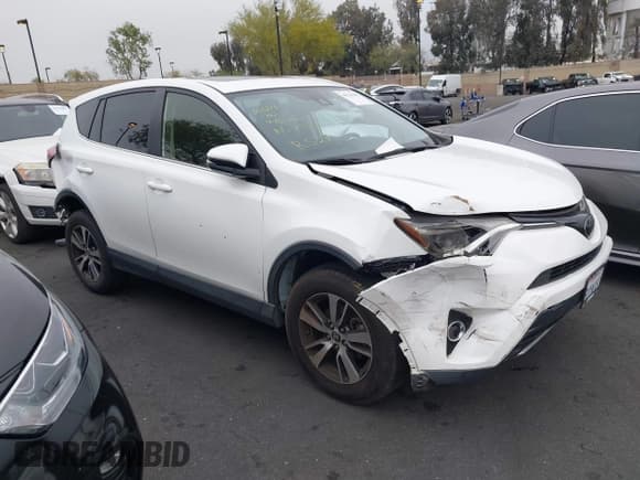 ✅ 2018 Toyota RAV4 XLE • VIN: JTMWFREV9JJ732074 • Lot: 42116868. Listed on IAAI with 93,015 mi. Free auction sales archive from the USA and detailed vehicle history report at DreamBid. Image 1.