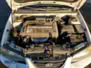 2004 Hyundai Elantra GLS z VIN KMHDN46D54U795500, wystawiony jako Copart lot #79738314 z przebiegiem 119 167 mil mil oraz Szkoda całkowita • Salvage title. Historia ofert i sprzedaży dostępna na DreamBid. Obrazek 12.