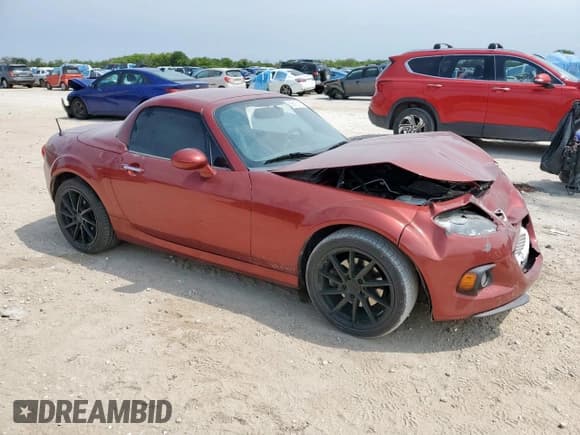 ✅ 2015 Mazda MX-5 Miata Grand Touring • VIN: JM1NC2PF7F0240304 • Lot: 69591515. Listed on Copart with 46,983 mi. Free auction sales archive from the USA and detailed vehicle history report at DreamBid. Image 4.