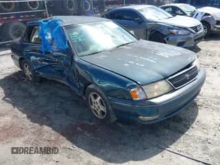 ✅ 1999 Toyota Avalon XL • VIN: 4T1BF18B5XU325129 • Лот: 42746214. Опубликован ранее на IAAI с пробегом 252 253 миль. Бесплатный доступ к архиву аукционных продаж из США и подробный отчёт об истории автомобиля на DreamBid. Изображение 1.