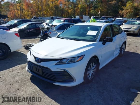 ✅ 2023 Toyota Camry Hybrid LE • VIN: 4T1C31AK6PU600899 • Lot: 43439972. Listed on IAAI with 67,001 mi. Free auction sales archive from the USA and detailed vehicle history report at DreamBid. Image 17.