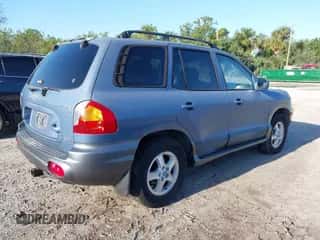 2003 Hyundai Santa Fe GLS с VIN KM8SC73D33U469955, выставлен на аукционе IAAI как лот 41989360 с пробегом 66 798 миль миль и . История ставок и продаж доступна на DreamBid. Изображение 4.
