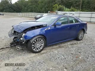 ✅ 2013 Cadillac CTS Performance • VIN: 1G6DK5E32D0160224 • Lot: 84301795. Listed on Copart with 104,572 mi. Free auction sales archive from the USA and detailed vehicle history report at DreamBid. Image 1.