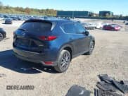 ✅ 2018 Mazda CX-5 Grand Touring • VIN: JM3KFBDM6J0473734 • Лот: 43536049. Опубликован ранее на IAAI с пробегом 124 488 миль. Бесплатный доступ к архиву аукционных продаж из США и подробный отчёт об истории автомобиля на DreamBid. Изображение 4.