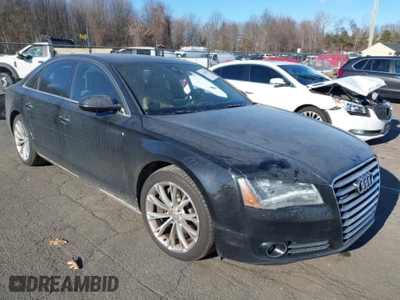✅ 2011 Audi A8 • VIN: WAUAVAFDXBN025061 • Лот: 41326516. Опубликован ранее на IAAI с пробегом 198 850 миль. Бесплатный доступ к архиву аукционных продаж из США и подробный отчёт об истории автомобиля на DreamBid. Изображение 1.