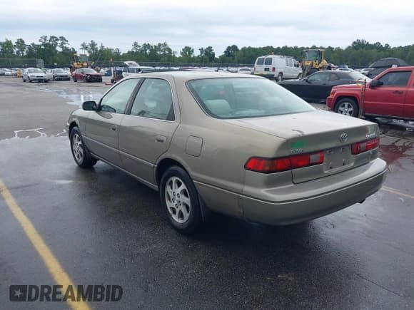 ✅ 1999 Toyota Camry LE • VIN: JT2BF22K9X0226073 • Lot: 42902726. Listed on IAAI with 264,241 mi. Free auction sales archive from the USA and detailed vehicle history report at DreamBid. Image 3.