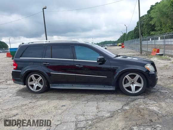 ✅ 2011 Mercedes-Benz GL 550 • VIN: 4JGBF8GEXBA651166 • Lot: 42505054. Listed on IAAI with 216,450 mi. Free auction sales archive from the USA and detailed vehicle history report at DreamBid. Image 12.