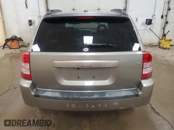✅ 2007 Jeep Compass Sport • VIN: 1J8FT47077D359579 • Lot: 63666695. Listed on Copart with 83,266 mi. Free auction sales archive from the USA and detailed vehicle history report at DreamBid. Image 6.