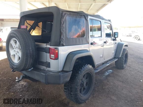 ✅ 2016 Jeep Wrangler Unlimited Sport • VIN: 1C4BJWDGXGL129081 • Lot: 43567358. Listed on IAAI with 120,099 mi. Free auction sales archive from the USA and detailed vehicle history report at DreamBid. Image 4.