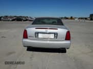 ✅ 2003 Cadillac DeVille DHS • VIN: 1G6KE54Y13U124690 • Lot: 73757984. Listed on Copart with 101,286 mi. Free auction sales archive from the USA and detailed vehicle history report at DreamBid. Image 6.