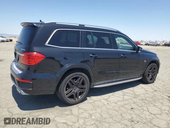✅ 2015 Mercedes-Benz GL 63 AMG • VIN: 4JGDF7EE8FA456517 • Lot: 61684425. Listed on Copart with 84,136 mi. Free auction sales archive from the USA and detailed vehicle history report at DreamBid. Image 3.