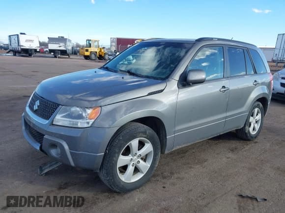 ✅ 2010 Suzuki Grand Vitara Limited • VIN: JS3TD0D7XA4100465 • Lot: 41647400. Listed on IAAI with 127,551 mi. Free auction sales archive from the USA and detailed vehicle history report at DreamBid. Image 2.
