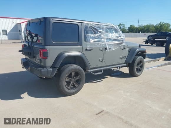 ✅ 2022 Jeep Wrangler Unlimited Sport S • VIN: 1C4HJXDG9NW103809 • Lot: 43302223. Listed on IAAI with Not provided. Free auction sales archive from the USA and detailed vehicle history report at DreamBid. Image 4.