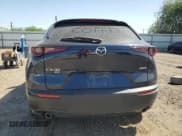 ✅ 2022 Mazda CX-30 S • VIN: 3MVDMBAL5NM423332 • Lot: 52527035. Listed on Copart with 25,609 mi. Free auction sales archive from the USA and detailed vehicle history report at DreamBid. Image 6.