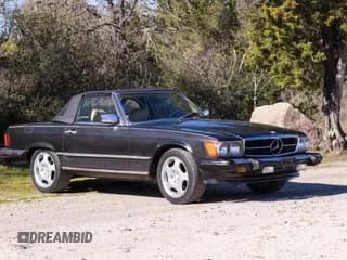 ✅ 1988 Mercedes-Benz 560 SL • VIN: WDBBA48D6JA089118 • Лот: 78076474. Опубликован ранее на Copart с пробегом 154 190 миль. Бесплатный доступ к архиву аукционных продаж из США и подробный отчёт об истории автомобиля на DreamBid. Изображение 1.