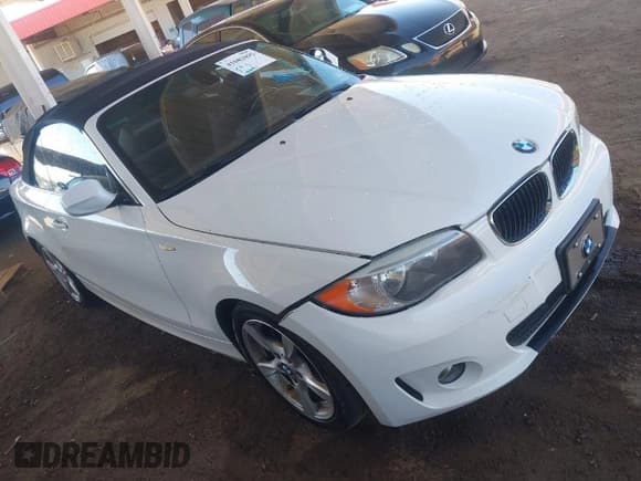 ✅ 2013 BMW 1 Series 128i • VIN: WBAUN1C55DVR01404 • Lot: 41682695. Listed on IAAI with 100,948 mi. Free auction sales archive from the USA and detailed vehicle history report at DreamBid. Image 1.