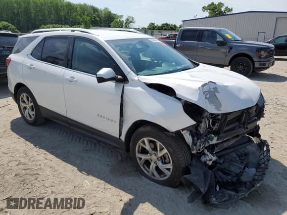 ✅ 2020 Chevrolet Equinox LT • VIN: 3GNAXVEX9LS591386 • Lot: 53841465. Listed on Copart with 59,265 mi. Free auction sales archive from the USA and detailed vehicle history report at DreamBid. Image 4.