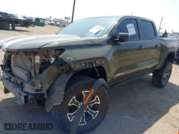 ✅ 2023 GMC Canyon 4WD AT4 • VIN: 1GTP6DEK5P1231432 • Lot: 41785102. Listed on IAAI with 33,154 mi. Free auction sales archive from the USA and detailed vehicle history report at DreamBid. Image 21.