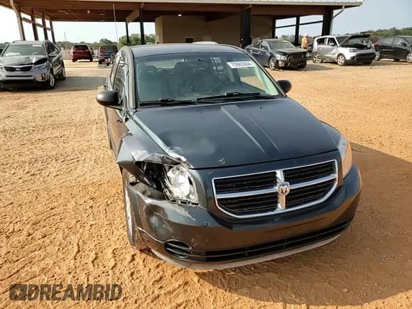 2008 Dodge Caliber SXT z VIN 1B3HB48B58D655965, wystawiony jako Copart lot #70965004 z przebiegiem 167 698 mil mil oraz Szkoda całkowita • Salvage title. Historia ofert i sprzedaży dostępna na DreamBid. Obrazek 12.