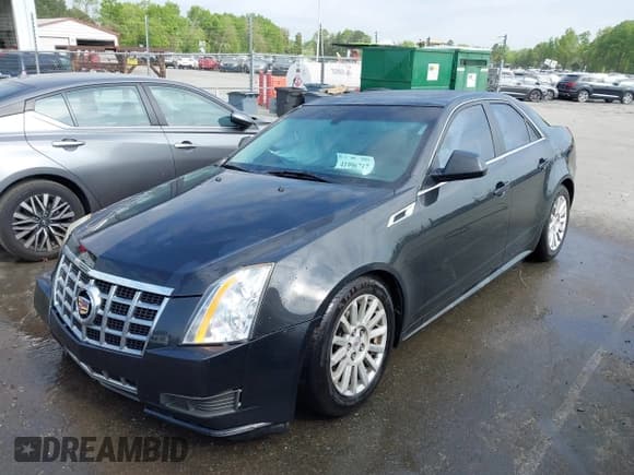 ✅ 2013 Cadillac CTS Luxury • VIN: 1G6DG5E56D0115726 • Lot: 41996717. Listed on IAAI with 216,011 mi. Free auction sales archive from the USA and detailed vehicle history report at DreamBid. Image 2.