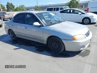 ✅ 2003 Kia Spectra • VIN: KNAFB121235258377 • Lot: 42146691. Wystawiony na IAAI z przebiegiem 174 992 mil. Bezpłatny archiwum sprzedaży aukcyjnych z USA i szczegółowy raport historii pojazdu na DreamBid. Zdjęcie 1.