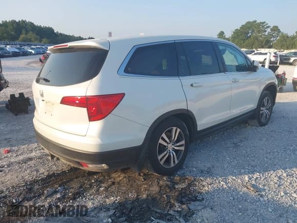 ✅ 2017 Honda Pilot EX-L • VIN: 5FNYF5H7XHB014193 • Lot: 43040443. Listed on IAAI with 246,920 mi. Free auction sales archive from the USA and detailed vehicle history report at DreamBid. Image 4.