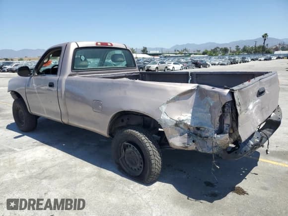 ✅ 2001 Toyota Tundra • VIN: 5TBJN32121S218803 • Лот: 56978205. Опубликован ранее на Copart с пробегом 166 979 миль. Бесплатный доступ к архиву аукционных продаж из США и подробный отчёт об истории автомобиля на DreamBid. Изображение 2.