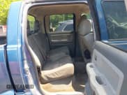 ✅ 2005 Dodge Dakota SLT • VIN: 1D7HW48N25S112499 • Lot: 42434700. Listed on IAAI with 216,817 mi. Free auction sales archive from the USA and detailed vehicle history report at DreamBid. Image 8.