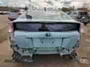 2018 Toyota Prius Two z VIN JTDKBRFU7J3058785, wystawiony jako Copart lot #90085795 z przebiegiem 83 292 mil mil oraz Szkoda całkowita • Salvage title. Historia ofert i sprzedaży dostępna na DreamBid. Obrazek 6.