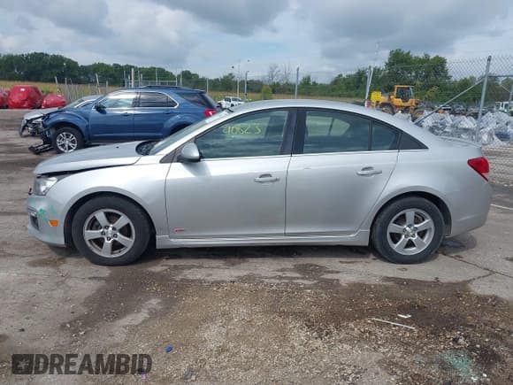 ✅ 2016 Chevrolet Cruze LT • VIN: 1G1PE5SB0G7212824 • Lot: 43140623. Listed on IAAI with 137,594 mi. Free auction sales archive from the USA and detailed vehicle history report at DreamBid. Image 14.
