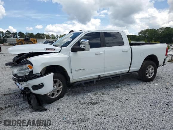 ✅ 2023 Ram 2500 Laramie • VIN: 3C6UR5FJ9PG500854 • Lot: 64947655. Listed on Copart with 47,813 mi. Free auction sales archive from the USA and detailed vehicle history report at DreamBid. Image 1.