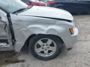 ✅ 2005 Jeep Grand Cherokee Laredo • VIN: 1J4GR48K95C661219 • Lot: 43694482. Listed on IAAI with 156,190 mi. Free auction sales archive from the USA and detailed vehicle history report at DreamBid. Image 13.